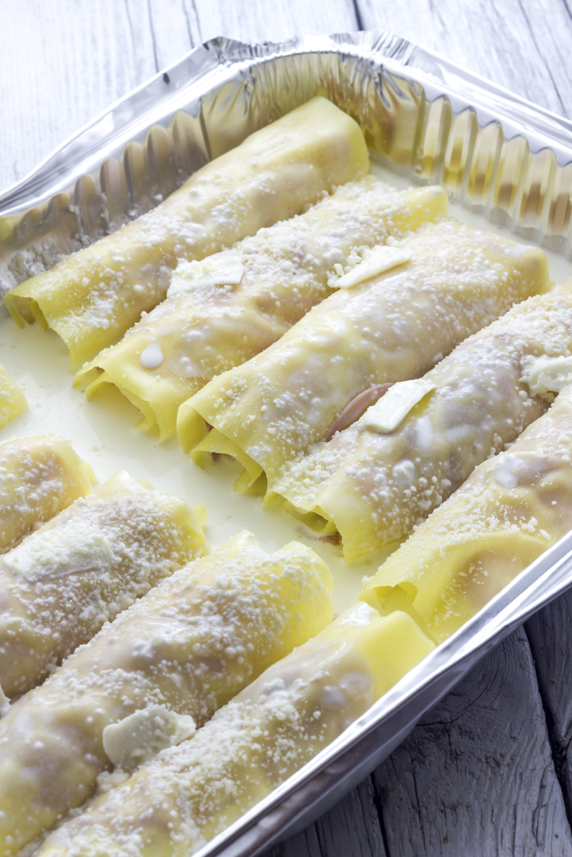 Canelones de choclo con salsa blanca