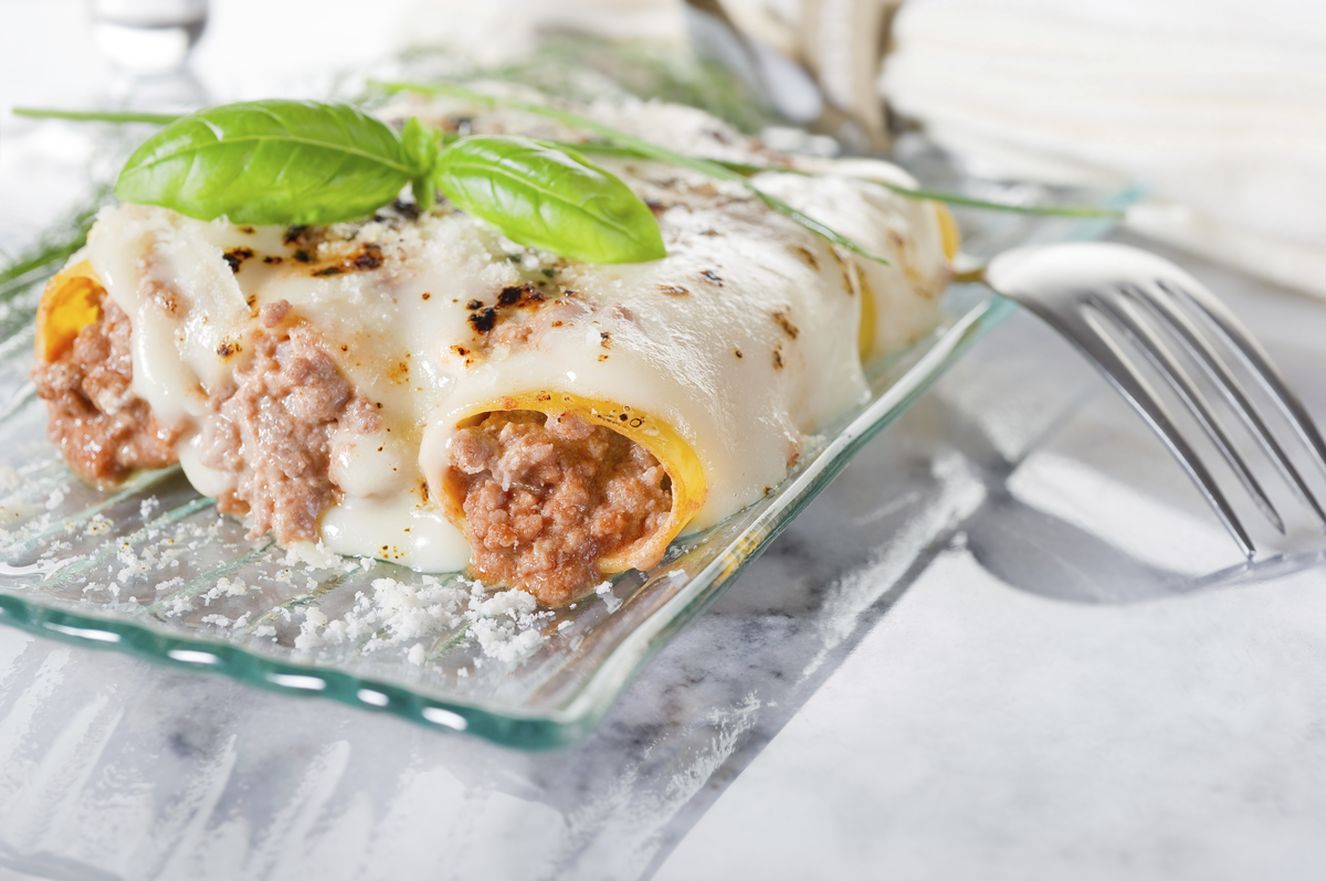 Canelones de carne y queso ricotta.