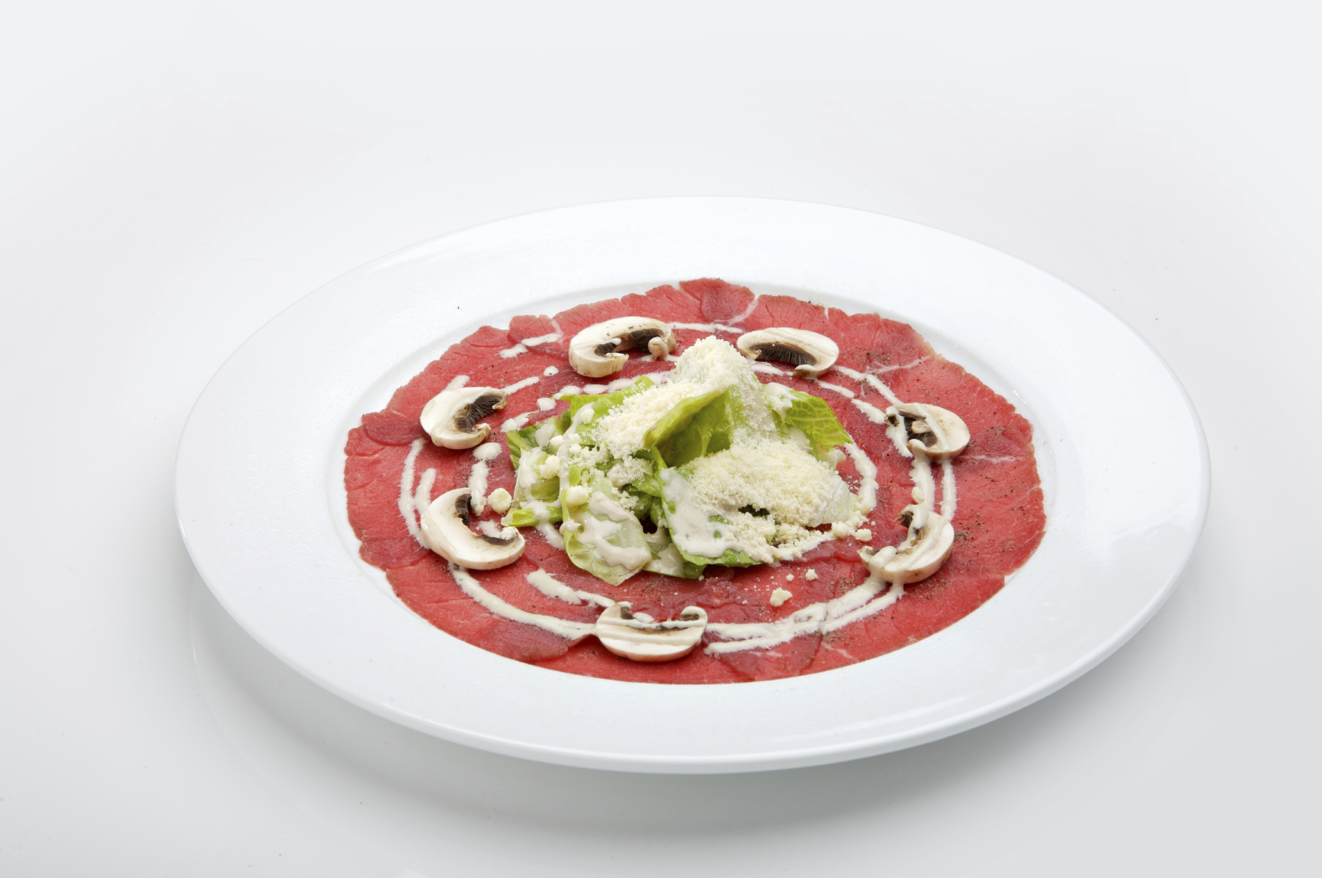 Carpaccio de ternera con champiñones
