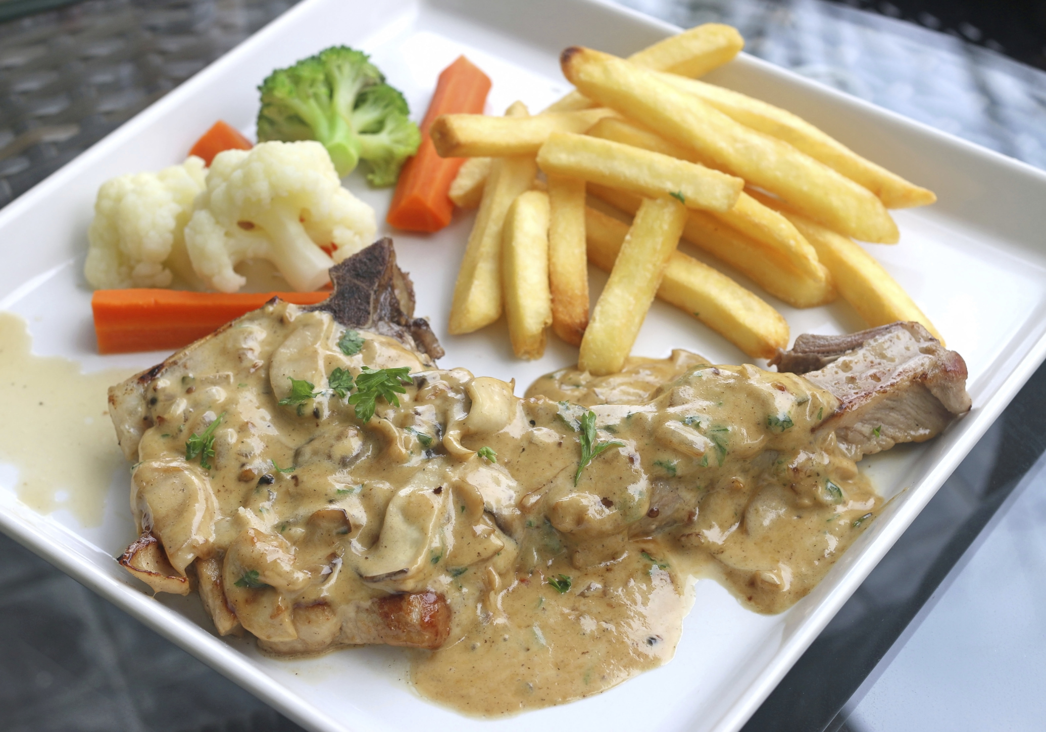 Chuletas de cerdo con champiñones