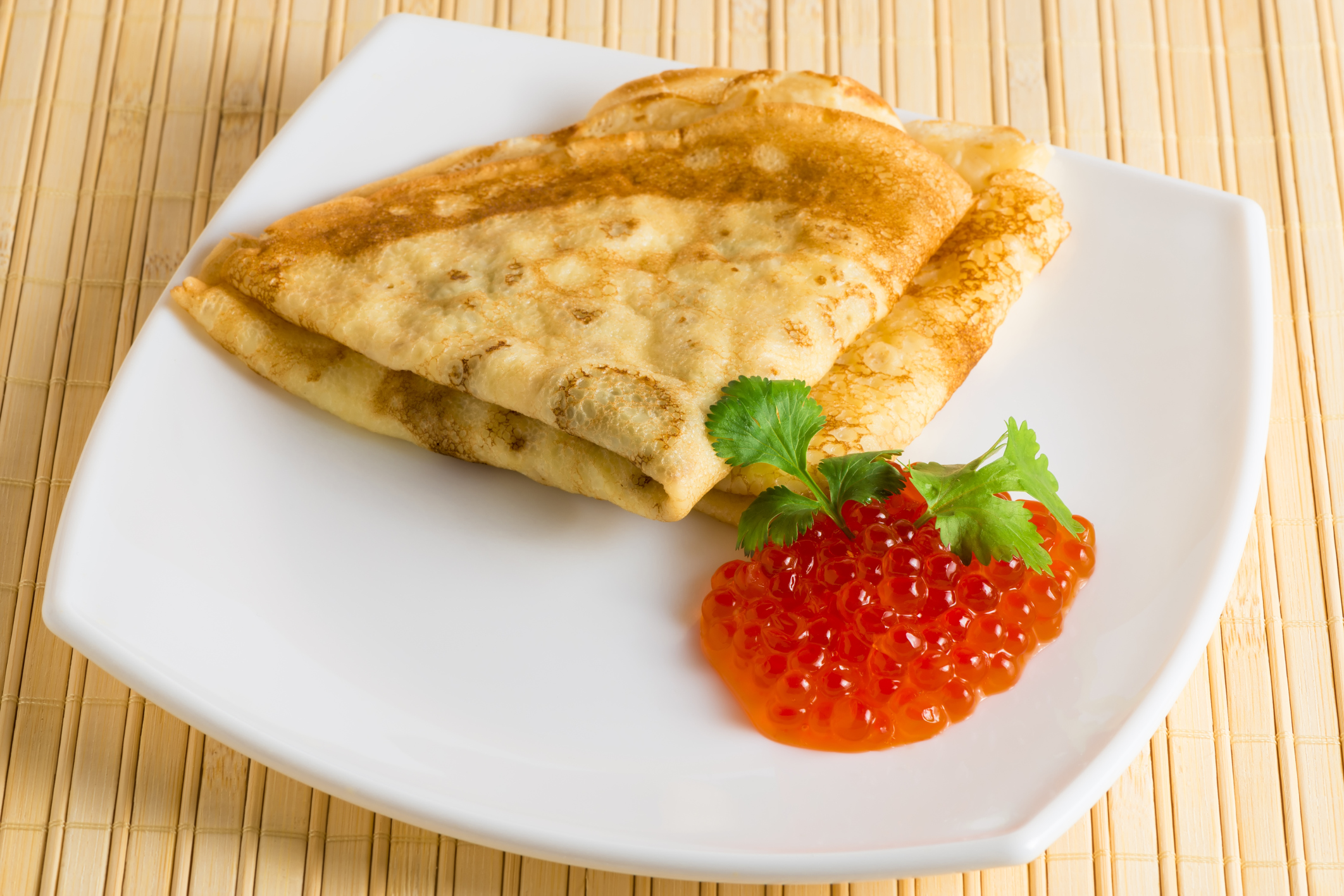 Crepes de bacalao con cebolleta