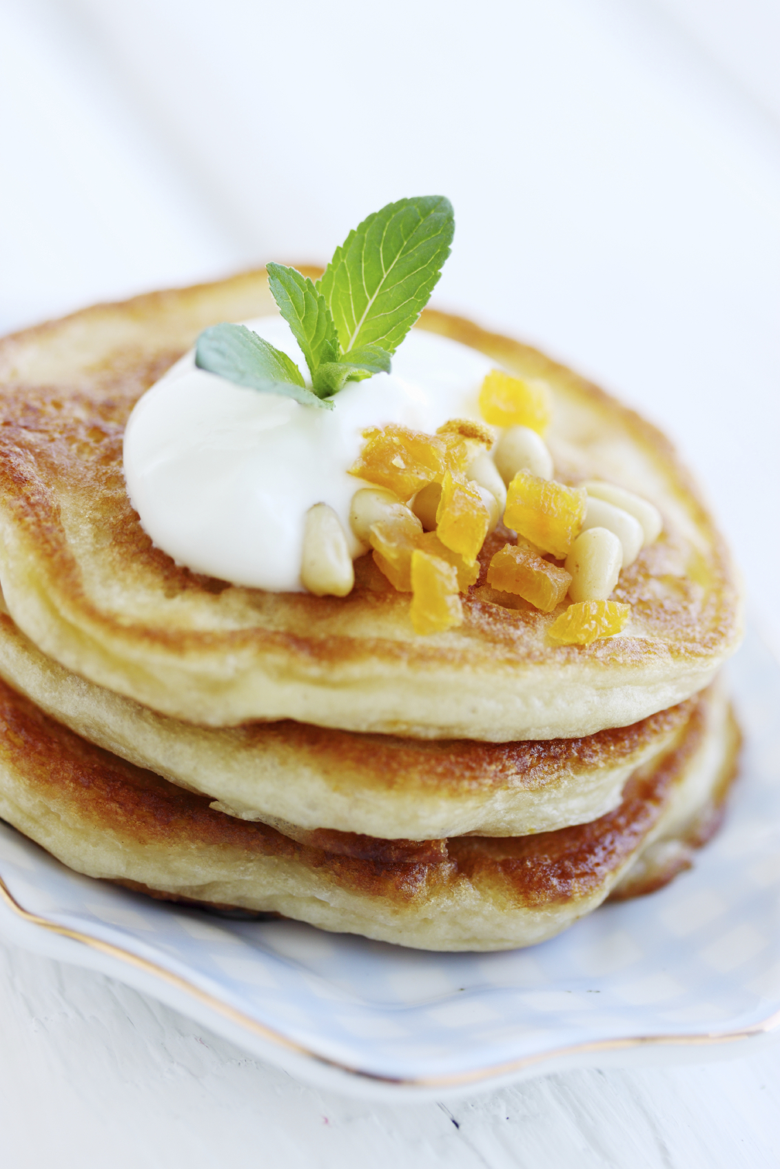 Crêpes de nueces y naranja con chantilly