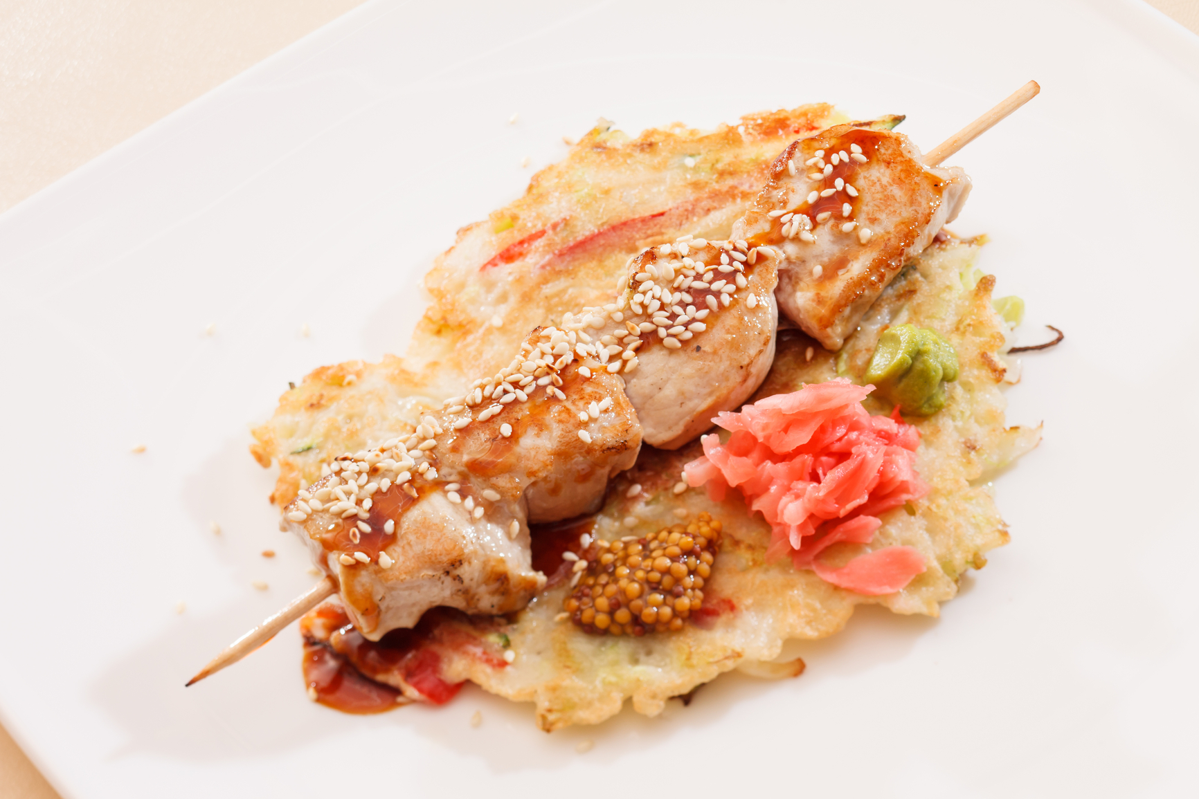 Cubitos de pollo al jengibre y ajonjolí