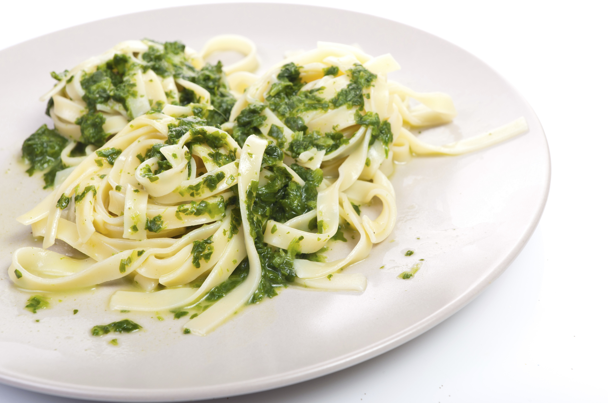 Pasta con espinacas y cebolla