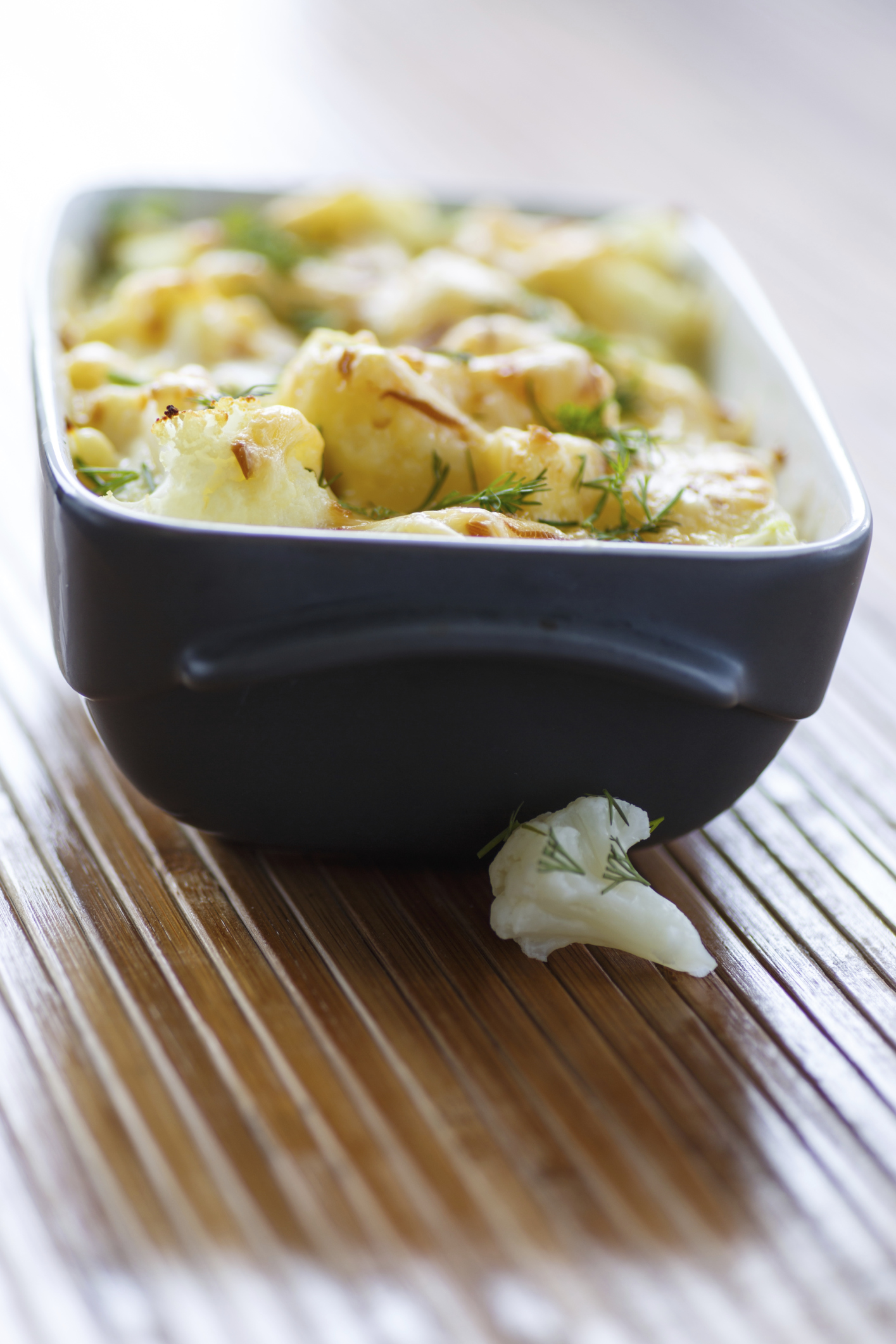 Pastelón de coliflor y espinacas al gratén