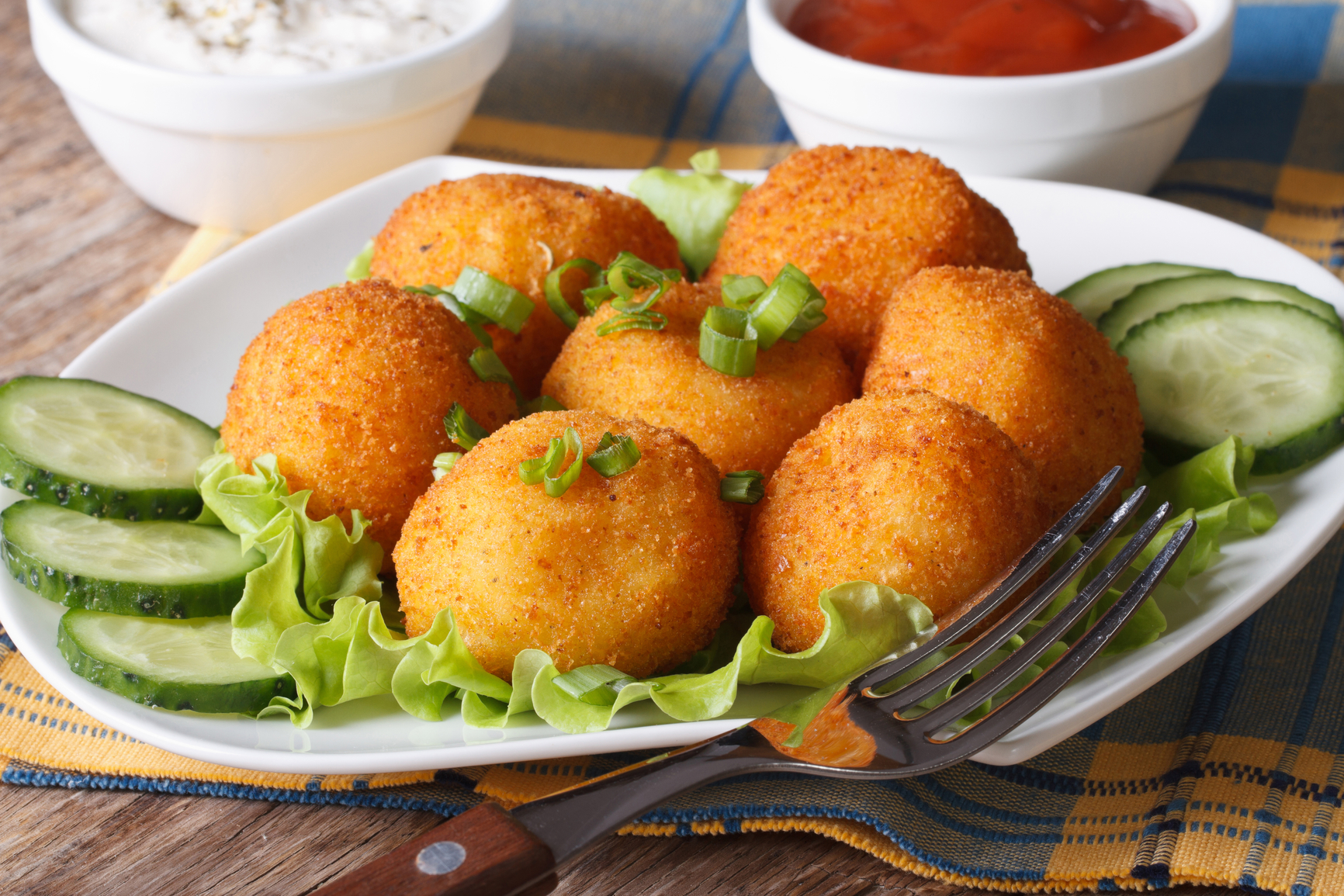 Puré de patata relleno rebozado