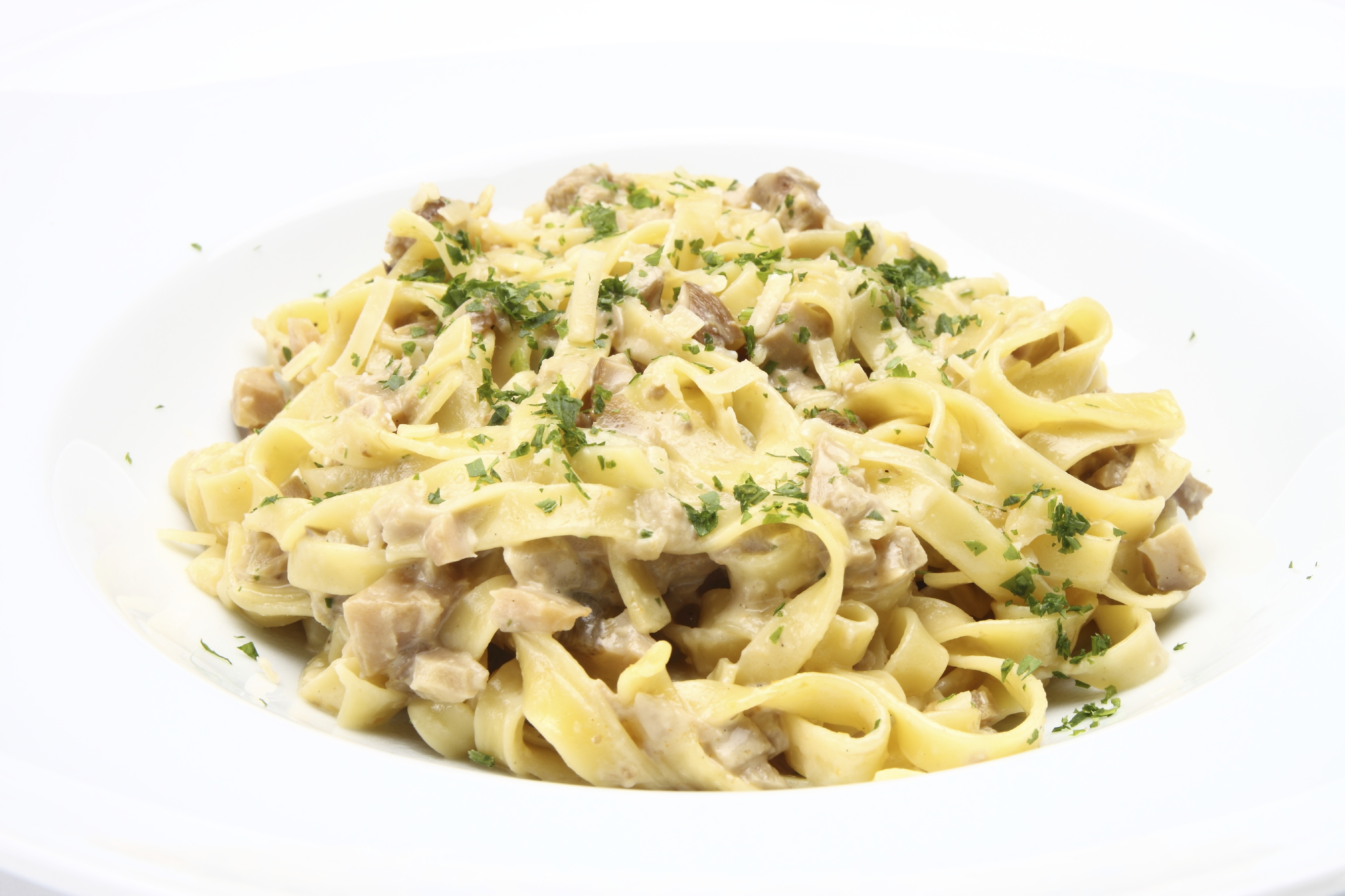 Pasta con crema de champiñones