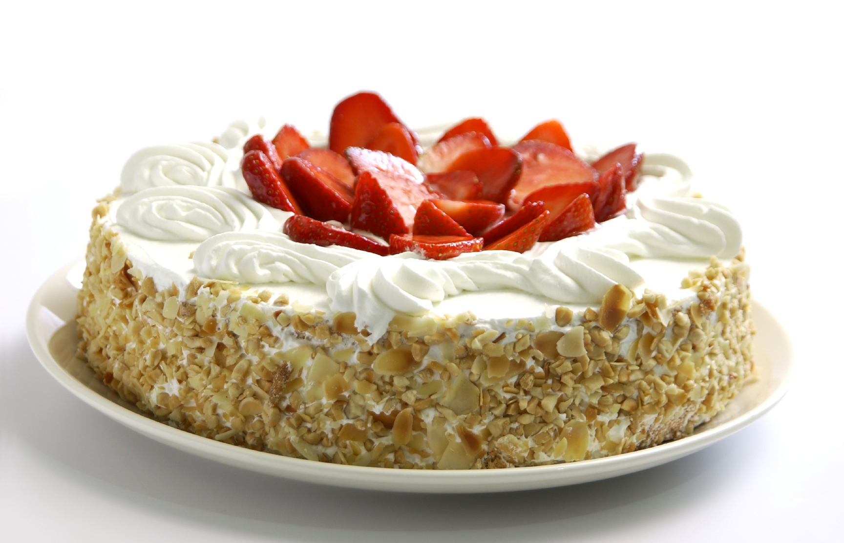 Tarta de crema pastelera, nata y almendras