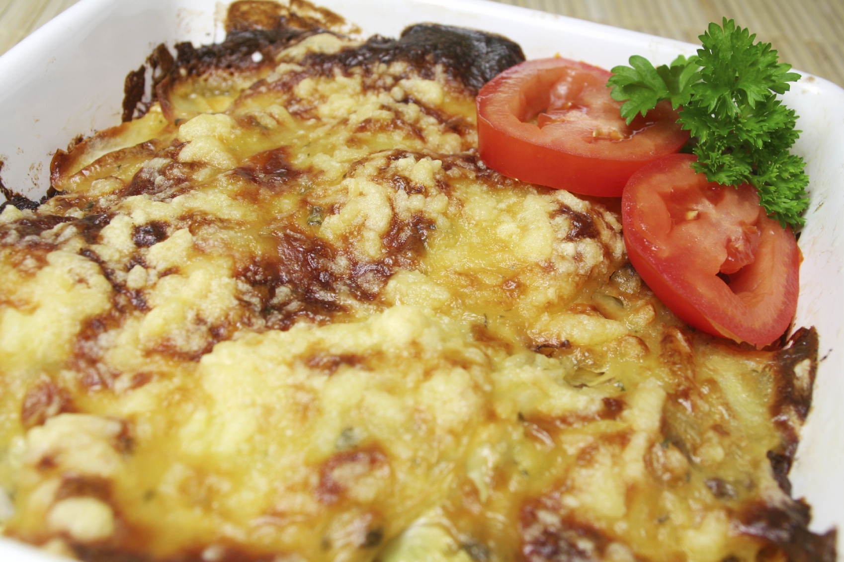 Tomates gratinados con huevo duro