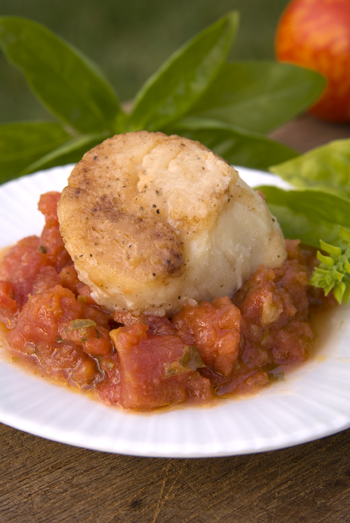 Vieiras en tempura con salsa de tomate