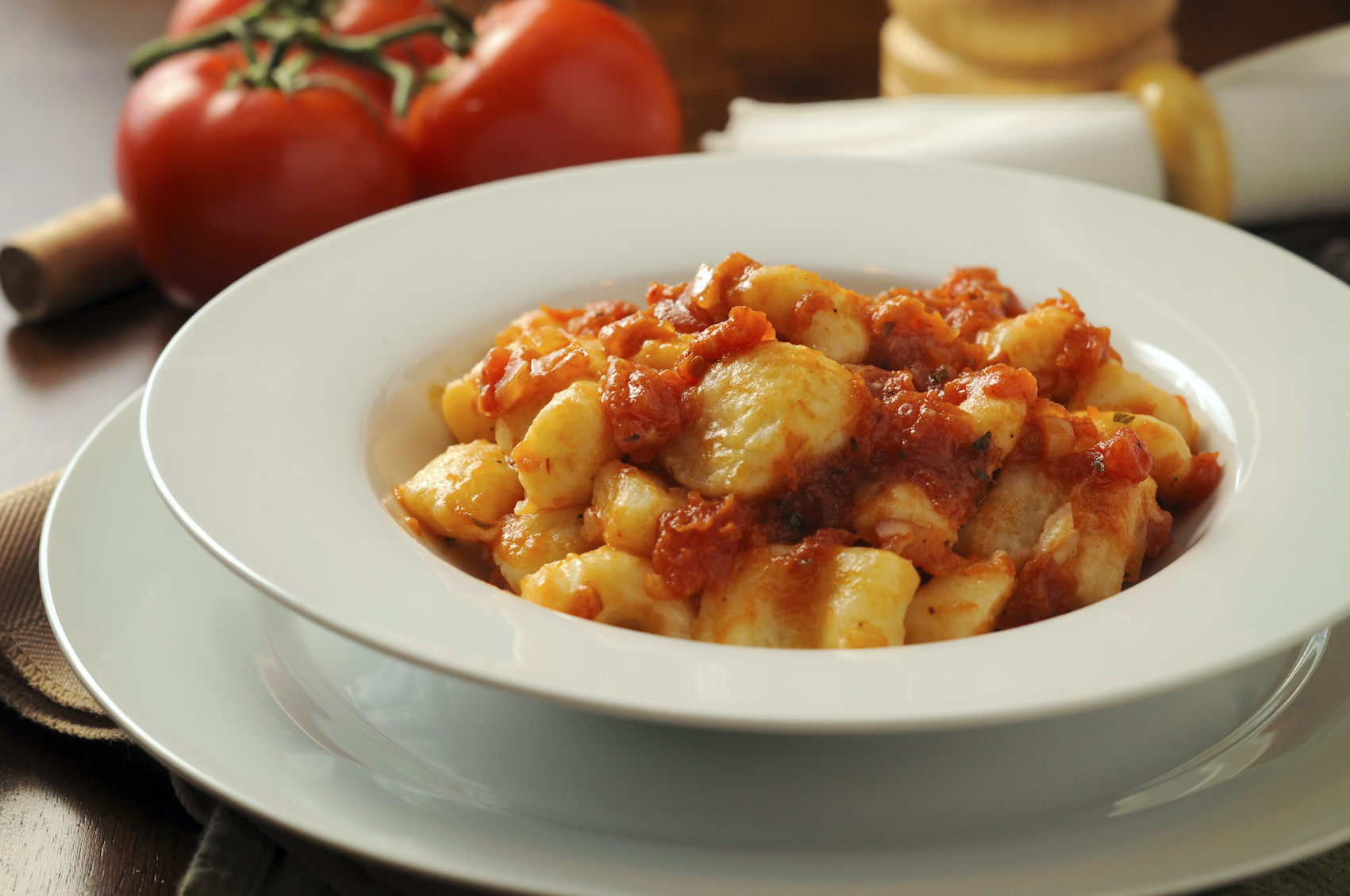 Ñoquis con salsa de tomate condimentada